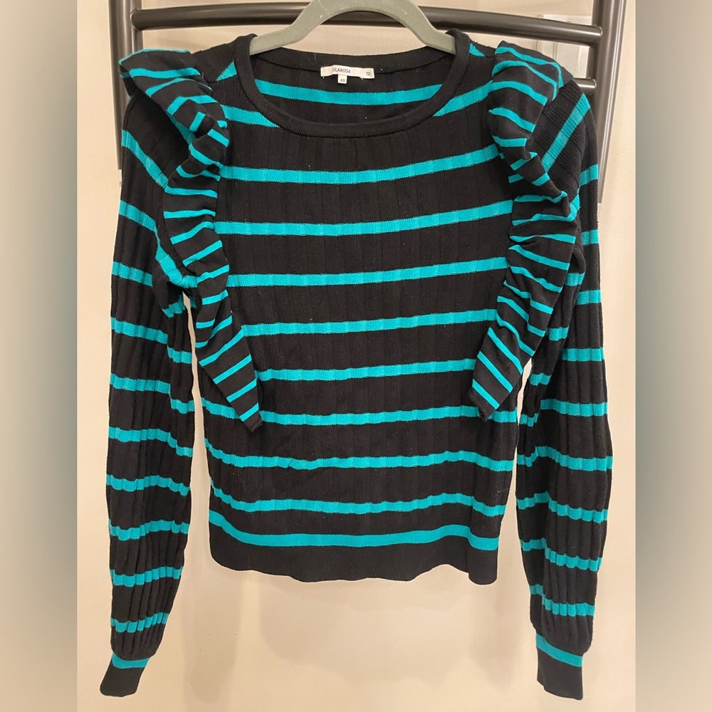 Stripped green and black sweater with ruffles